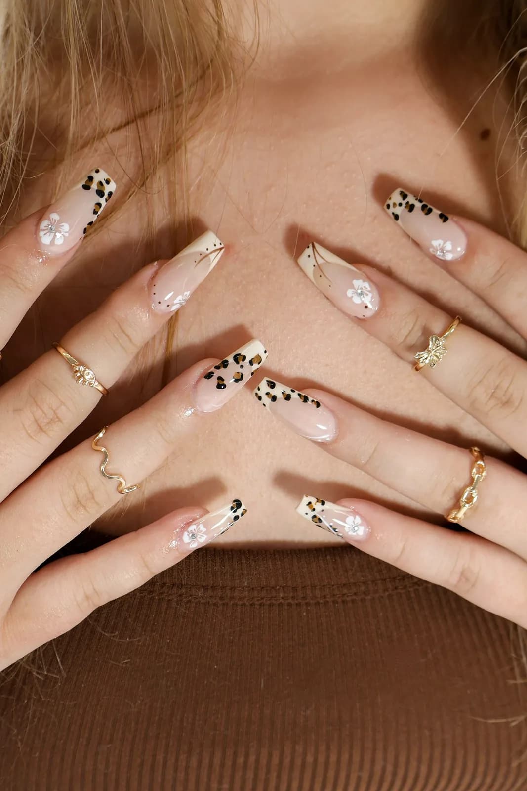 Coffin nails with tan leopard French tips and white flower accents