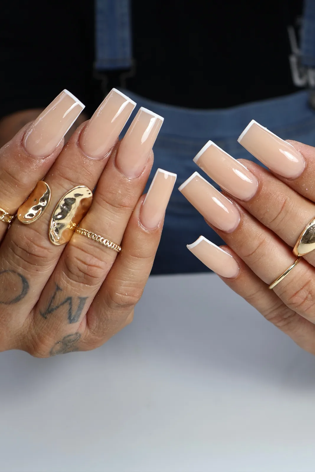 Glossy nude square acrylic nails, a clean neutral full set