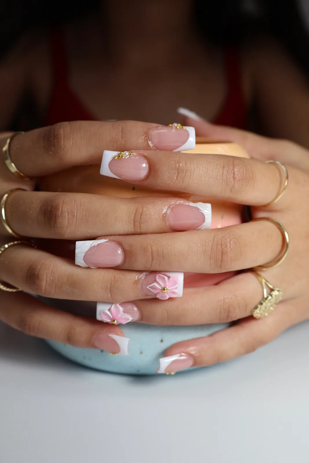 White French coffin nails with pink 3D flowers and gold charms